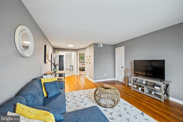 living room with hardwood / wood-style floors