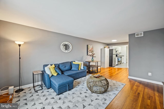 living room featuring light hardwood / wood-style floors