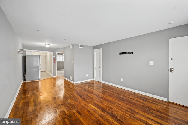 unfurnished room with light hardwood / wood-style flooring