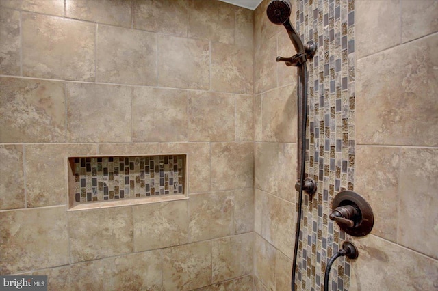 details featuring a tile shower