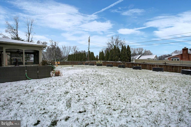 view of yard covered in snow