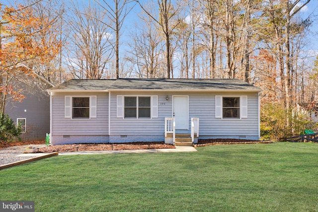 view of front of home with a front lawn