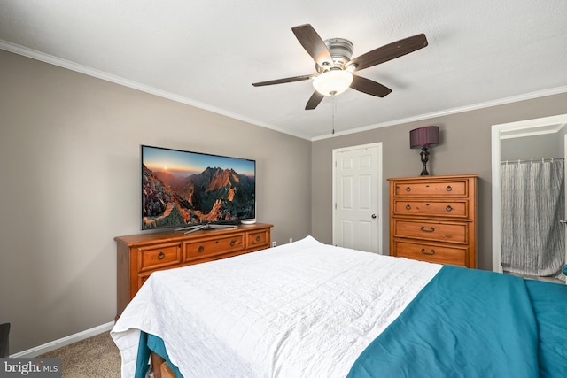 bedroom featuring ceiling fan, carpet floors, and crown molding