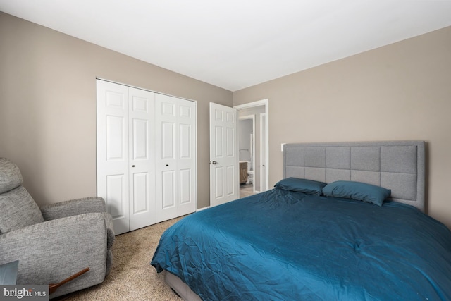 carpeted bedroom with a closet