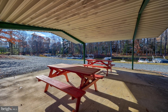 surrounding community featuring a patio