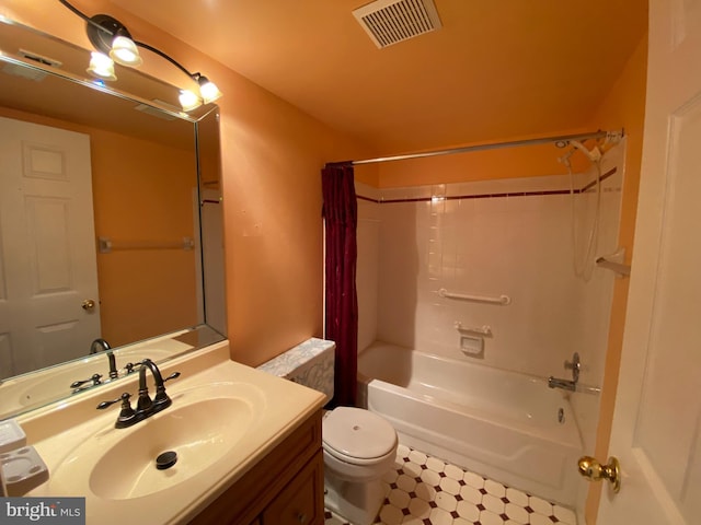 full bathroom featuring vanity, toilet, and shower / bath combo with shower curtain