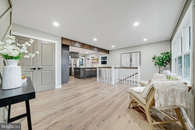 living room with light hardwood / wood-style floors