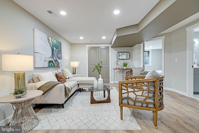 living room featuring light wood-type flooring