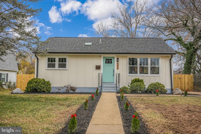 ranch-style house with a front yard