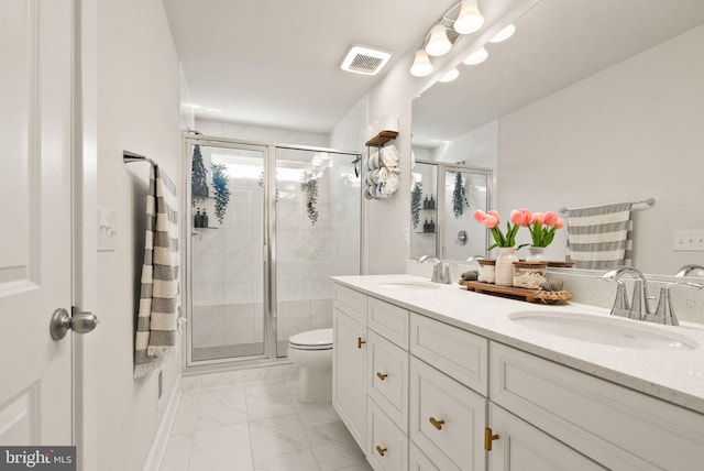 full bath with marble finish floor, a shower stall, visible vents, and a sink