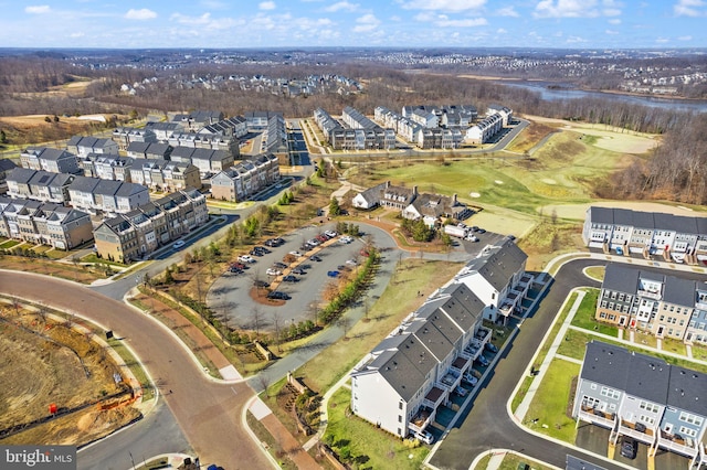 birds eye view of property with a residential view and golf course view