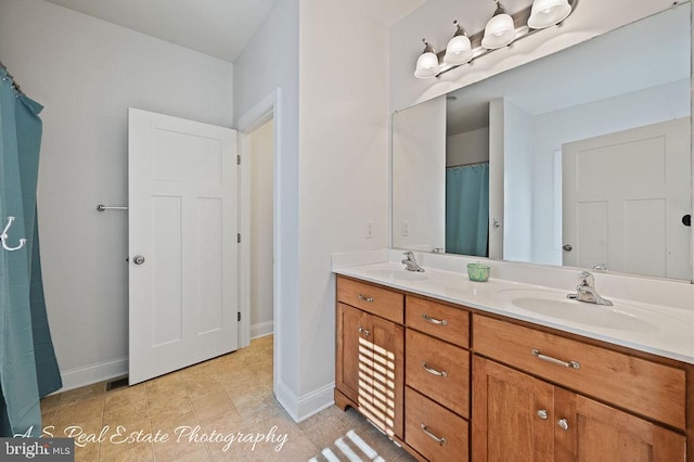 bathroom featuring vanity and tile patterned floors