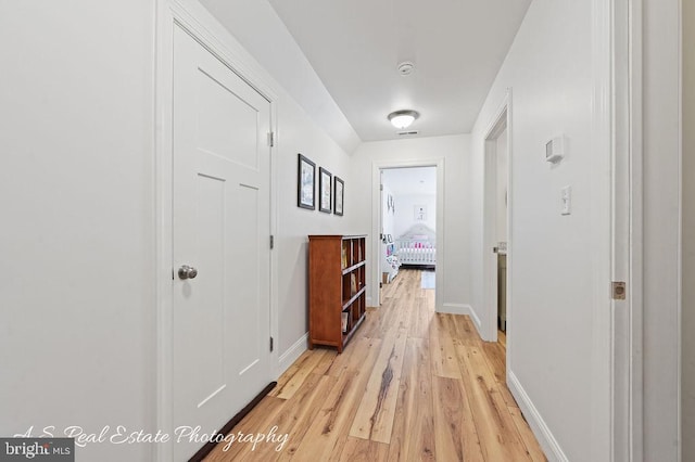 hallway featuring light hardwood / wood-style floors