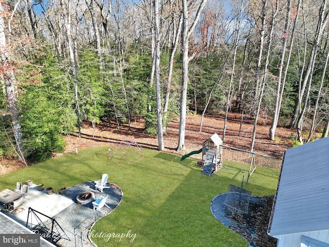 view of yard with a playground