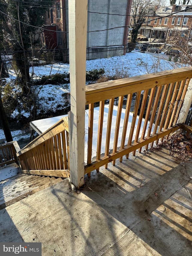 view of snow covered deck