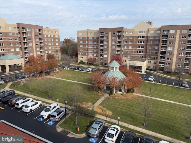 12251 Roundwood Rd Unit 601, Lutherville Timonium, MD 21093 - view of apartment building / complex featuring uncovered parking