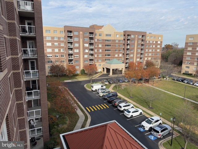 12251 Roundwood Rd Unit 601, Lutherville Timonium, MD 21093 - view of apartment building / complex featuring uncovered parking