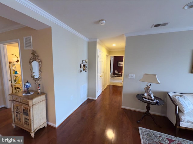 hallway with crown molding and dark hardwood / wood-style floors