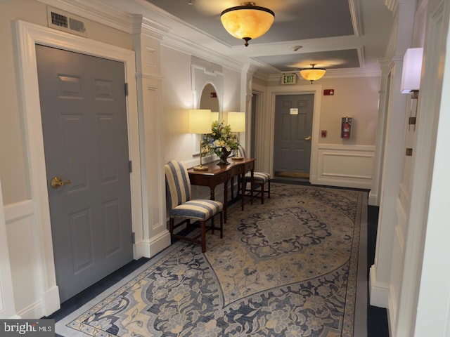 entryway with crown molding