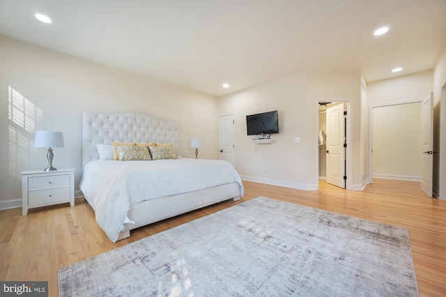 bedroom featuring light wood-type flooring