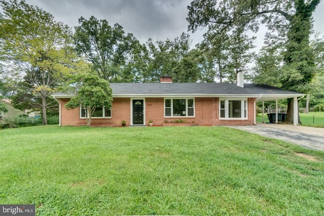 single story home with a carport and a front lawn