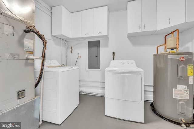 washroom featuring cabinets, washing machine and clothes dryer, electric panel, and water heater