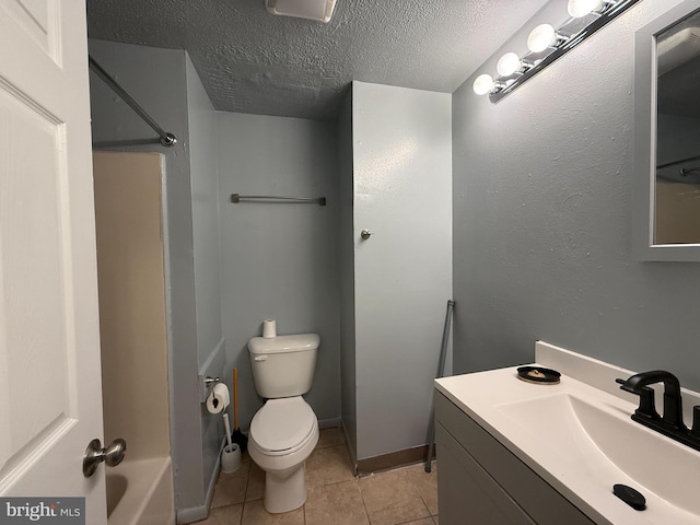 full bathroom with vanity, tile patterned floors, toilet, a textured ceiling, and shower / bath combination