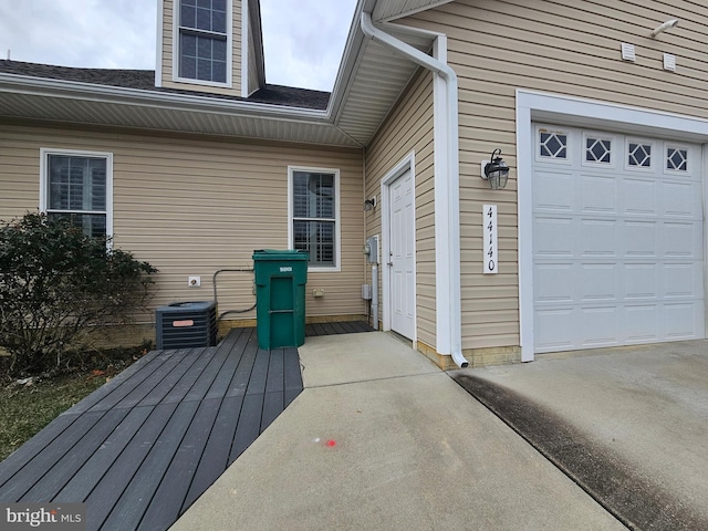 entrance to property featuring central AC unit