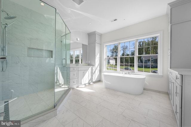 bathroom with shower with separate bathtub and vanity