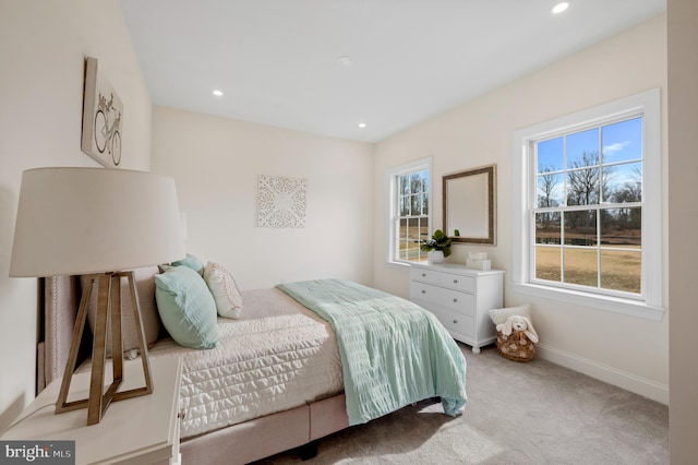 bedroom with light colored carpet