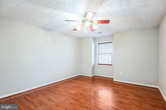 unfurnished room featuring hardwood / wood-style floors, a textured ceiling, and ceiling fan