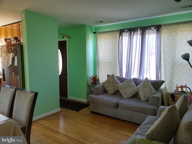 living room featuring light wood-type flooring