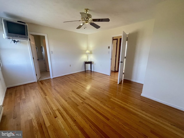 interior space with hardwood / wood-style flooring and ceiling fan