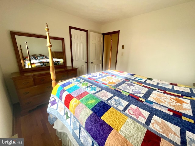 bedroom featuring wood-type flooring