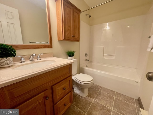 full bathroom featuring tile patterned flooring, vanity, shower / bathtub combination, and toilet