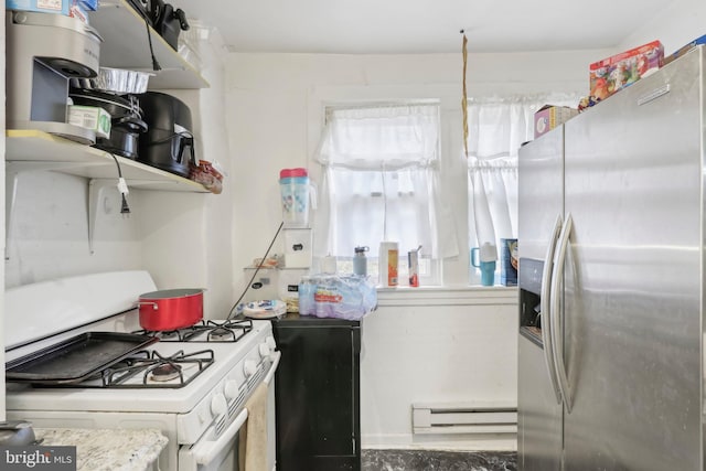 kitchen with baseboard heating, stainless steel fridge with ice dispenser, and white gas stove