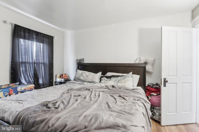 bedroom with light hardwood / wood-style flooring