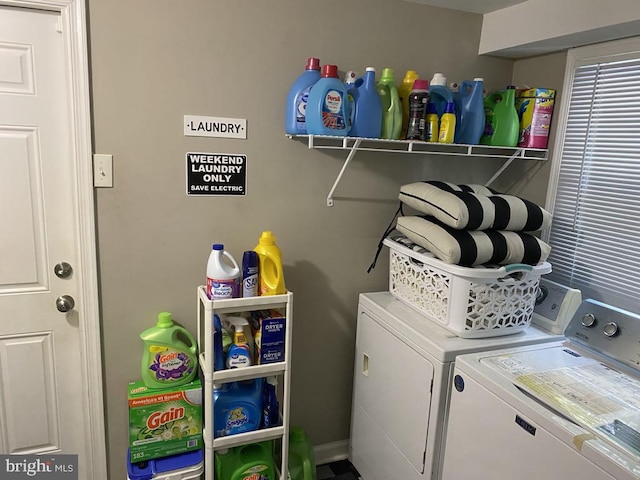 laundry room with separate washer and dryer