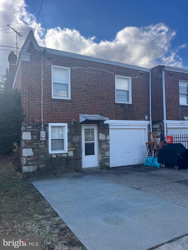 view of property featuring a garage