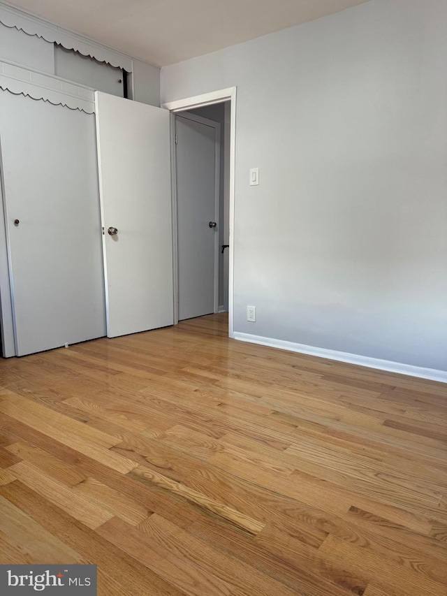 unfurnished bedroom featuring light hardwood / wood-style flooring