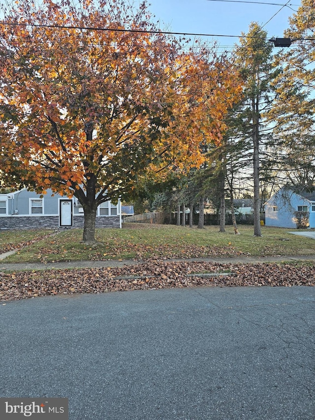 view of property hidden behind natural elements