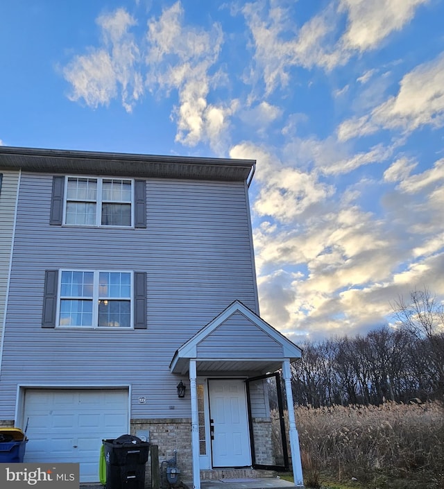 view of front of property with a garage