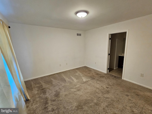 view of carpeted spare room