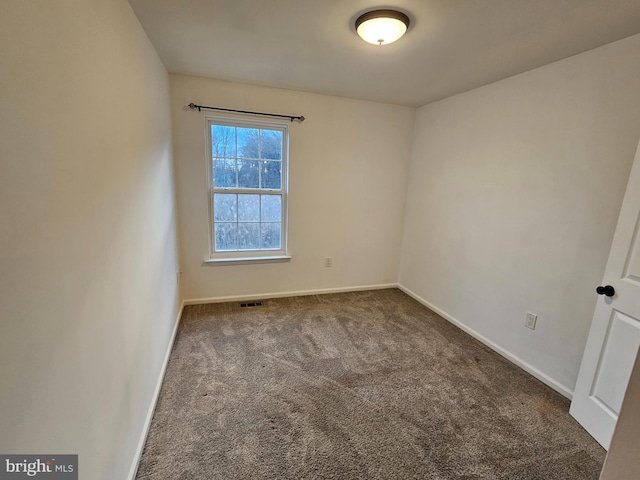 empty room featuring carpet