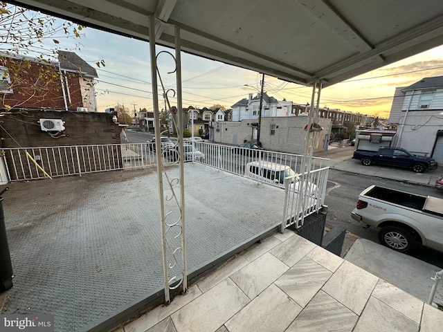 view of patio terrace at dusk