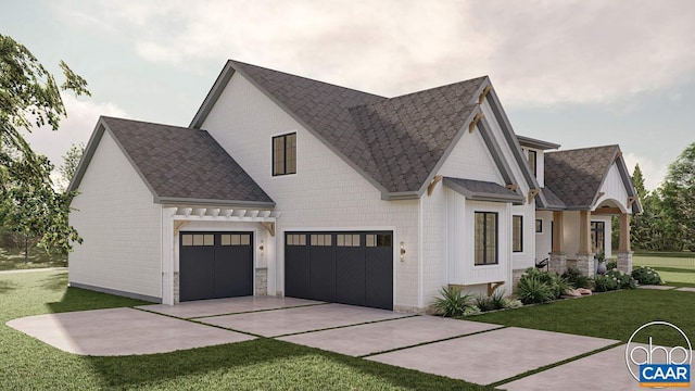 view of front of house with a front lawn and a garage