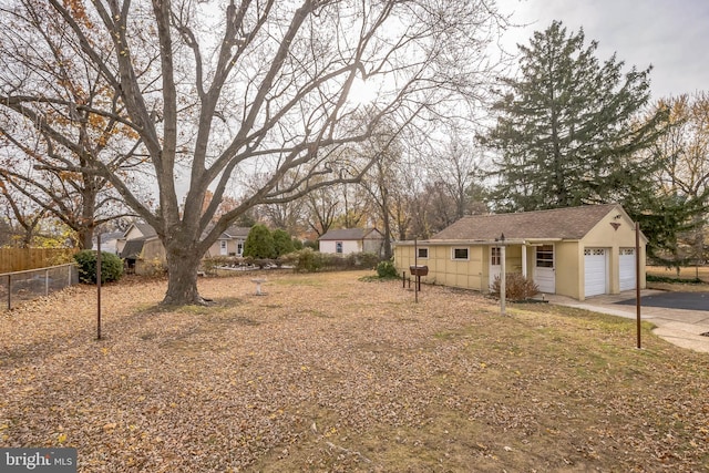 view of yard with a garage