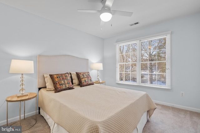 carpeted bedroom featuring ceiling fan