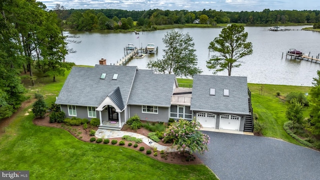 drone / aerial view with a water view