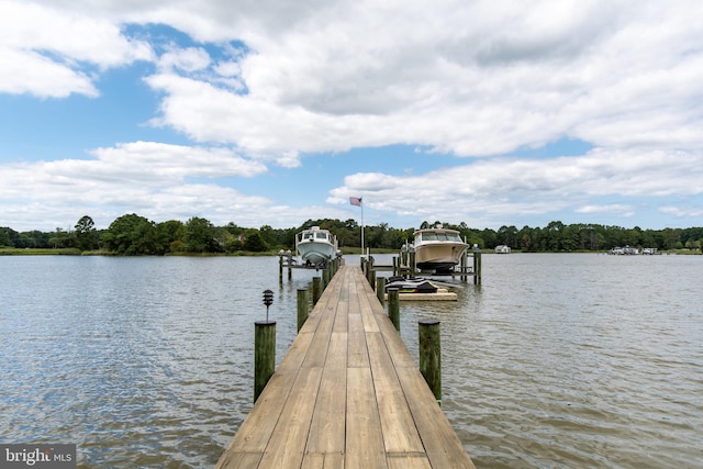 view of dock with a water view and boat lift